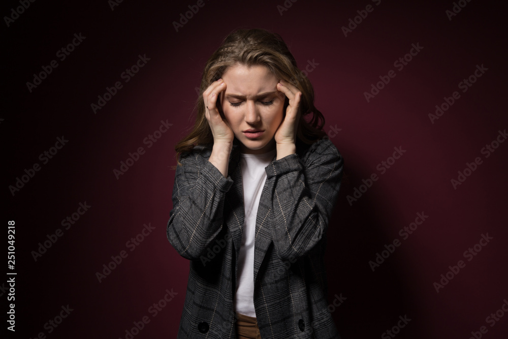 Health And Pain. Stressed Exhausted Young Woman Having Strong Tension Headache. Closeup Portrait Sick Girl Suffering From Head Migraine, Feeling Pressure And Stress. Health And Pain. Stressed Exhausted Young Woman Having Strong Tension Headache. Closeup Portrait Sick Girl Suffering From Head Migraine, Feeling Pressure And Stress.
