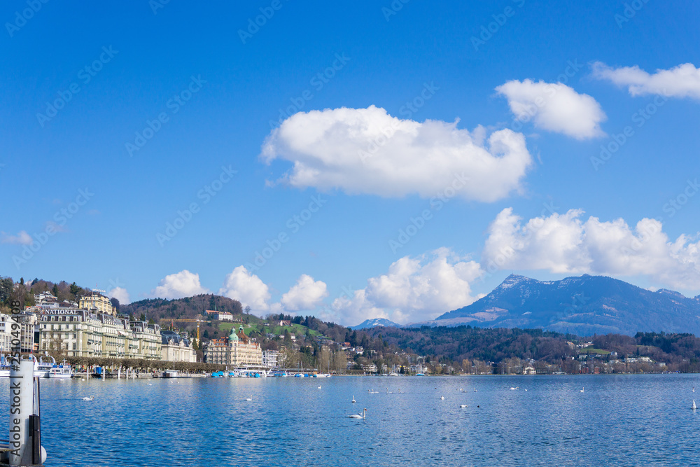 View of lake Lucerne with the view of mountains and Swiss Alps in the background, sunny day