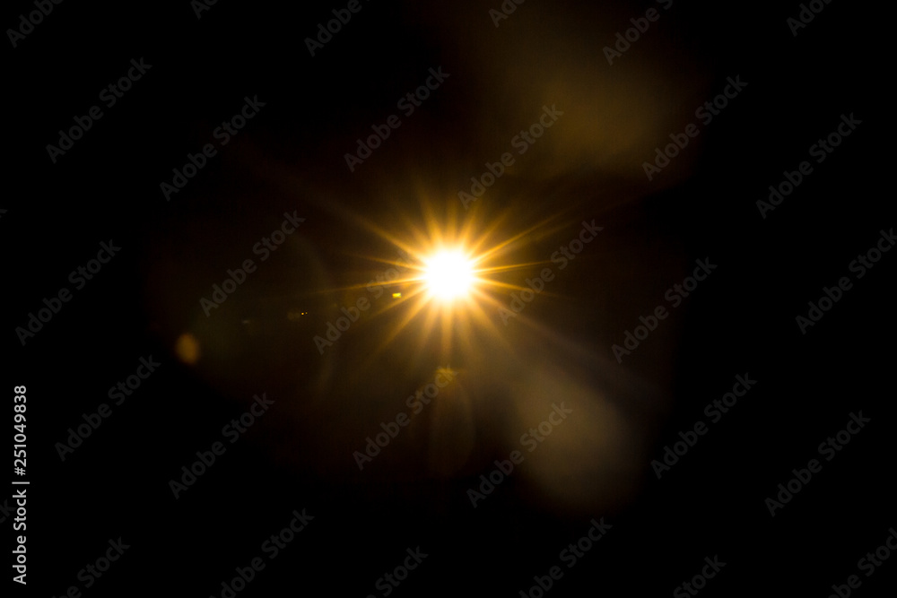 Abstract Natural Sun flare on the black background. Abstract Natural Sun flare on the black background.