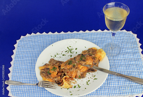 Mushroom Omelet with Crystal Glass or Riesling on Blue BG photo