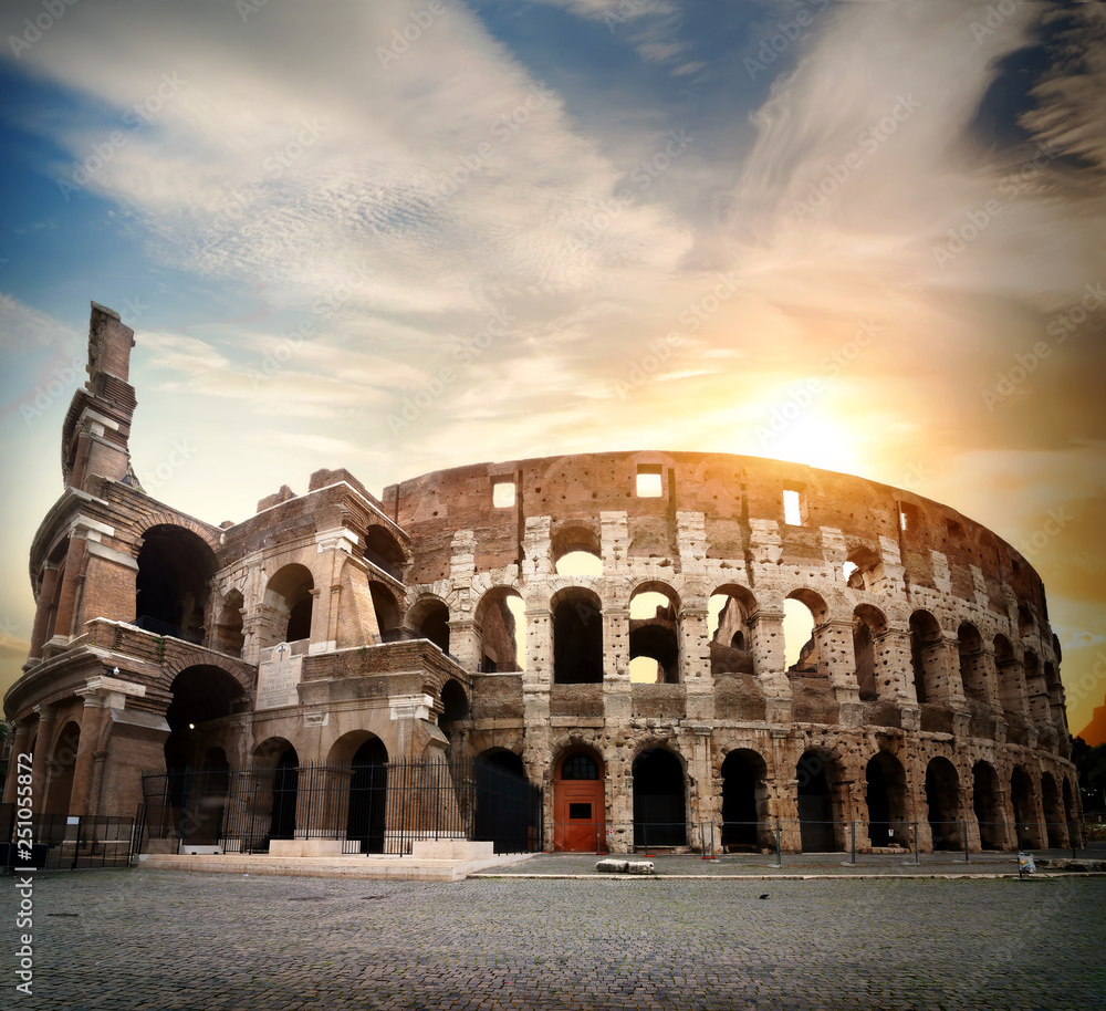 Bright sun and Colosseum