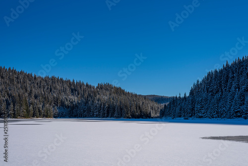 frozen mountain lake in Bulgaria © Petar