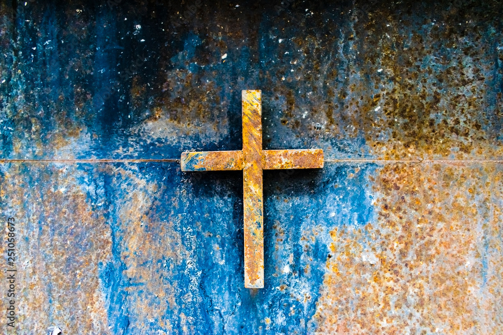 Cross relief  rusted iron