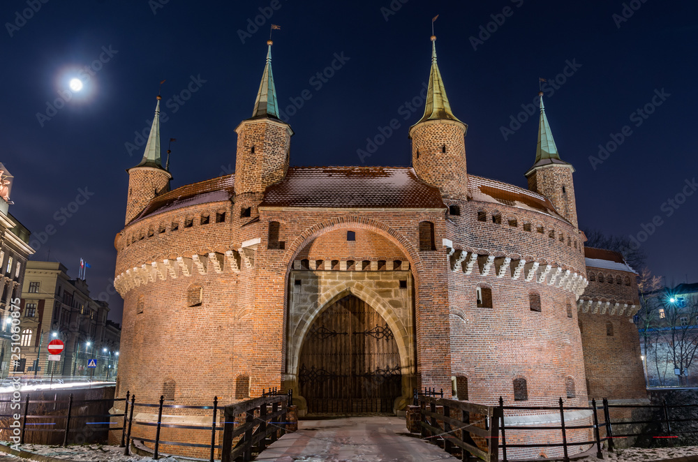Krakow, Poland, medieval barbican (Barbakan) in the night