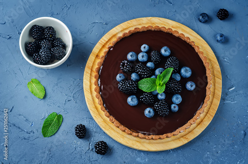 Chocolate tart with blackberries and blueberries