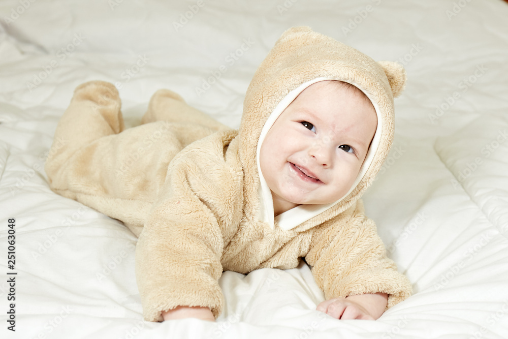 In a beautiful suit cheerful little child In a beautiful suit cheerful little child
