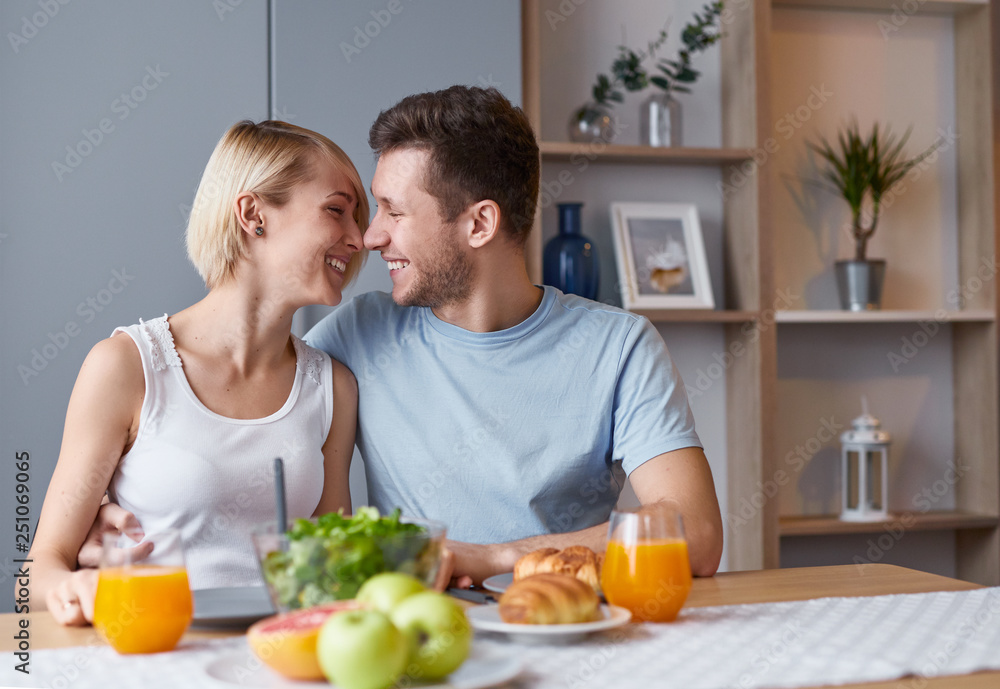 Affectionate couple enjoying healthy and delicious meal 