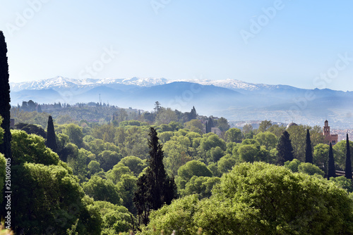View of Granada and Sierra Nevada mountain range from Alcazaba fortress, Alhambra, Granada, Spain
