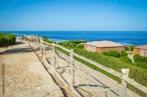 Fototapeta Naklejka Na Ścianę i Meble -  Stylish stepping path to the sea background