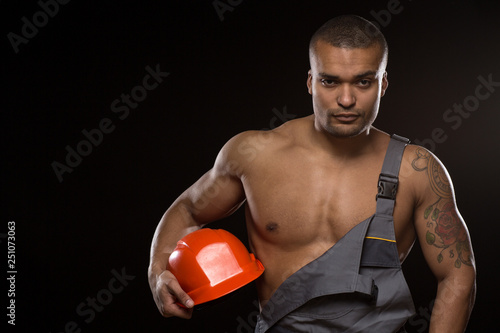 Sexy shirtless strong constructionist photo