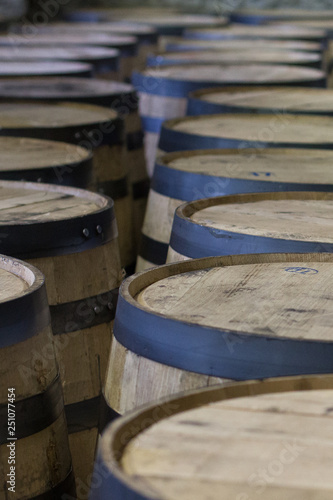 Wooden Bourbon Barrels in a Vertical line