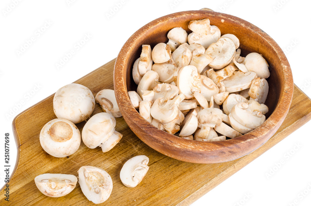 Sliced fresh white champignons for cooking. Sliced fresh white champignons for cooking.