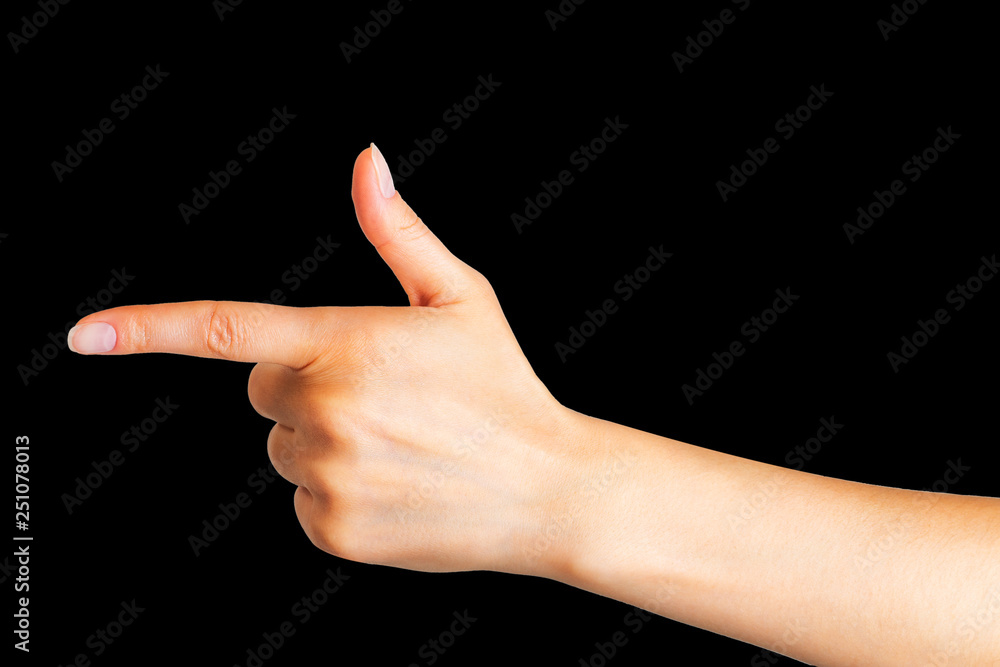 Woman hand with the index finger pointing up or showing direction