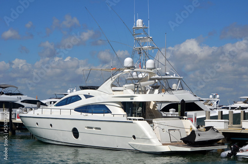 White motor yacht moored at a marina on Miami Beach,Florida