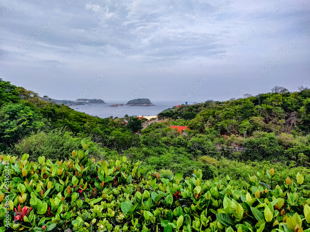 Landscape overlook to the Pacific Ocean in Huatulco, Oaxaca. Travel in Mexico. Resort vacation.