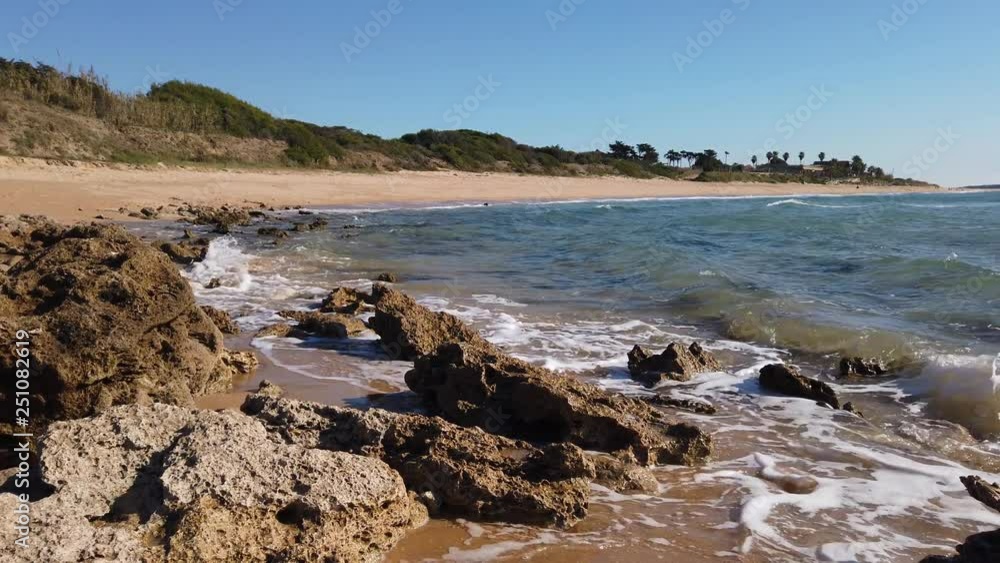 Outflow on the Zahora Beach. Costa de Luz, Cadiz, Spain - slow motion 4k footage Outflow on the Zahora Beach. Costa de Luz, Cadiz, Spain - slow motion 4k footage