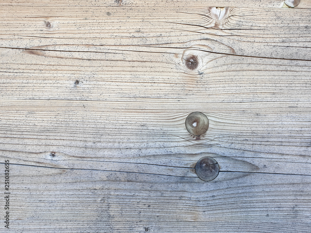Obraz premium Close-up of a wooden privacy screen with dark splay knots.