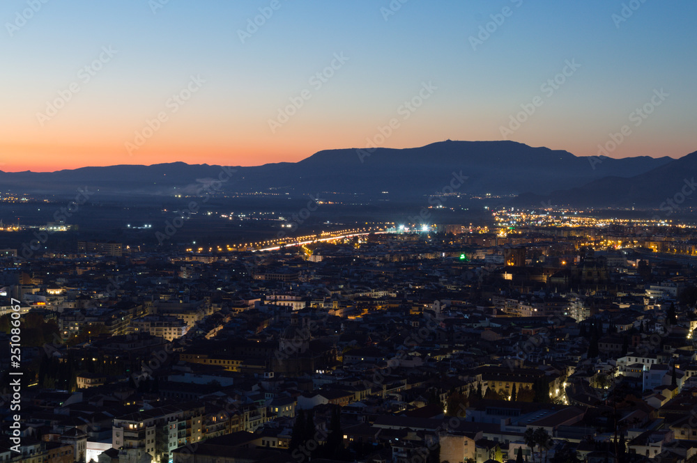 Afterglow with Cityscape and Mountains at Mirador del Barranco del Abogado Lookout in Granada, Spain