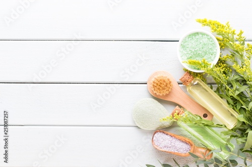 Beauty and fashion concept with spa set on pastel rustic wooden background.