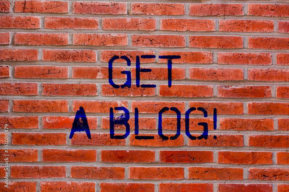 Obraz premium Text sign showing Get A Blog. Conceptual photo Start writing on social networks blogging modern communication Brick Wall art like Graffiti motivational call written on the wall