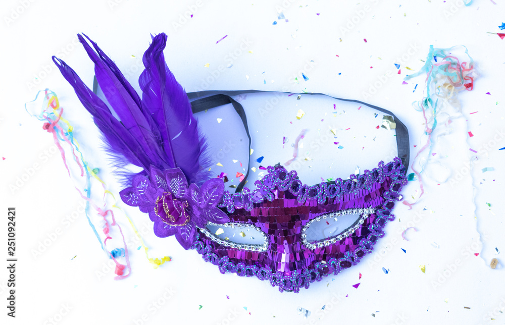 Fototapeta premium Top view Carnival mask on white background.