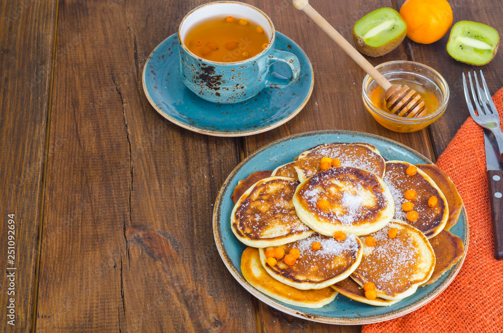 fried pancakes with sugar on plate to Shrovetide fried pancakes with sugar on plate to Shrovetide