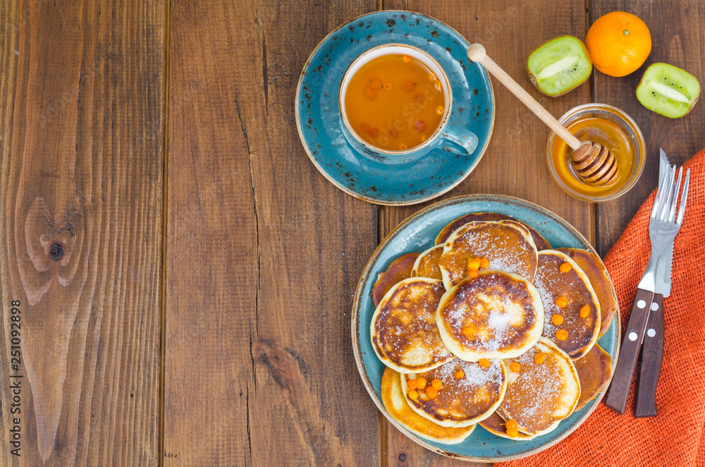 fried pancakes with sugar on plate to Shrovetide fried pancakes with sugar on plate to Shrovetide
