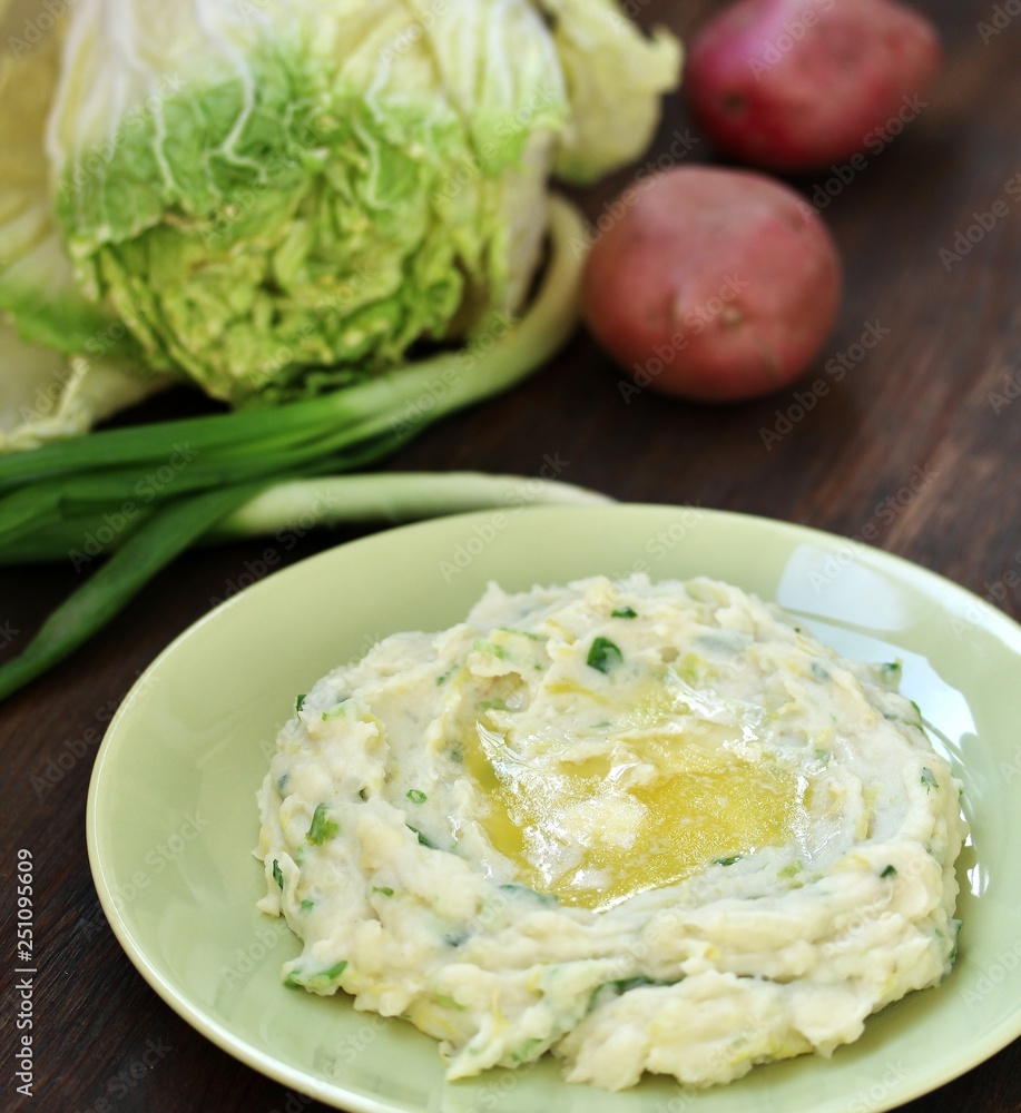 Colcannon Irish Mashed Potatoes St Patrick day food. puree with green onions and butter. copy space. top view Colcannon Irish Mashed Potatoes St Patrick day food. puree with green onions and butter. copy space. top view