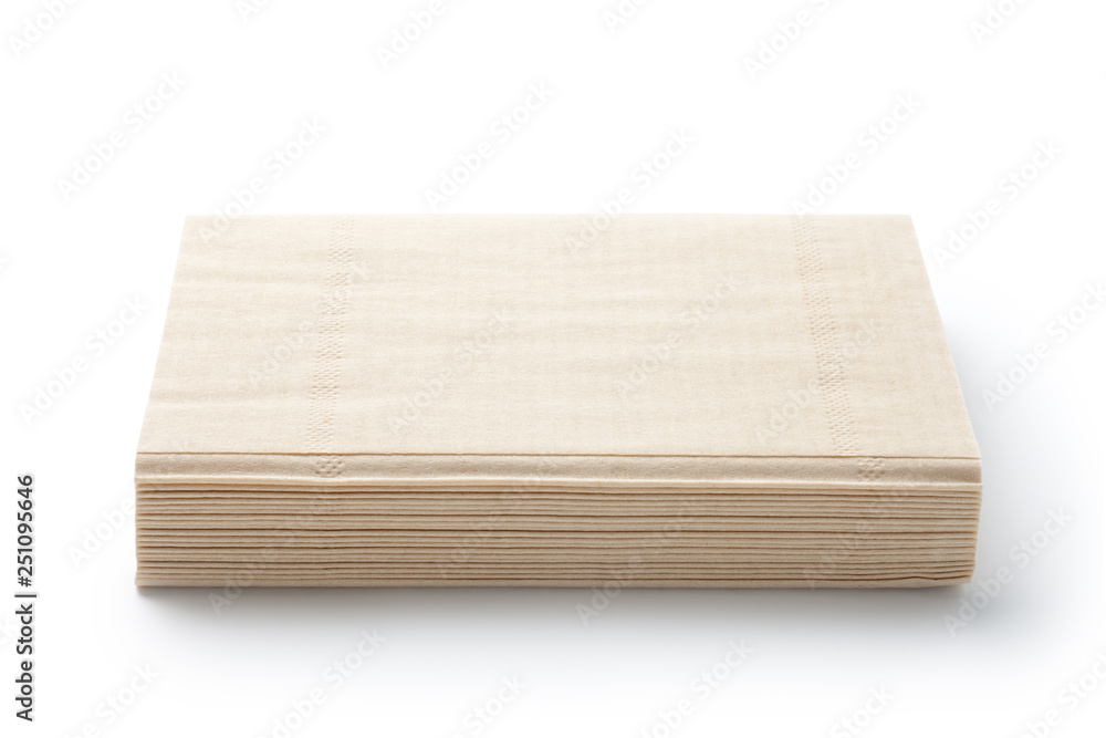 Pile of brown napkins isolated on white background Pile of brown napkins isolated on white background