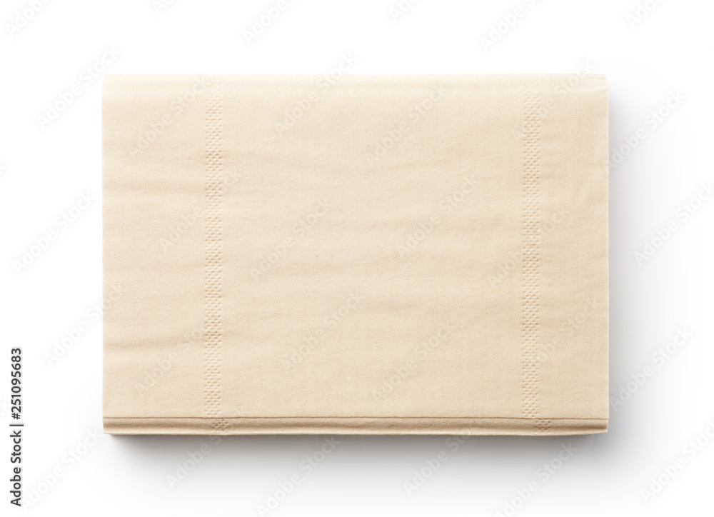 Pile of brown napkins isolated on white background. Top view. Pile of brown napkins isolated on white background. Top view.