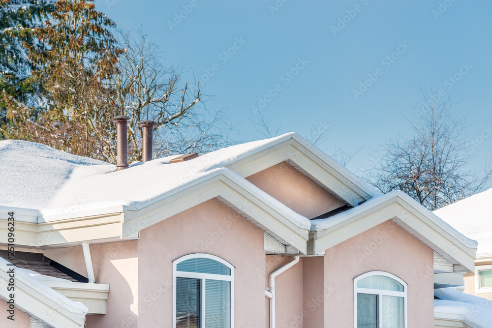 A perfect neighbourhood. Houses in suburb at Winter in the north America. Luxury houses covered nice snow. A perfect neighbourhood. Houses in suburb at Winter in the north America. Luxury houses covered nice snow.