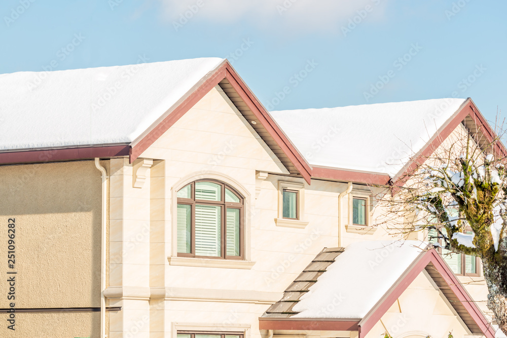 A perfect neighbourhood. Houses in suburb at Winter in the north America. Luxury houses covered nice snow. A perfect neighbourhood. Houses in suburb at Winter in the north America. Luxury houses covered nice snow.