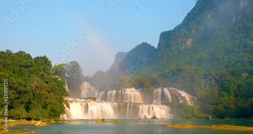 Beautiful waterfall rainbow. Ban Gioc waterfall or Detian waterfall is a collective name for two waterfalls in border Cao Bang, Vietnam and Daxin County, China. Amazing landscape in Vietnam and China photo