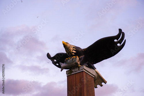 View of bald eagle wood sculpture in Port Alberni, Canada photo