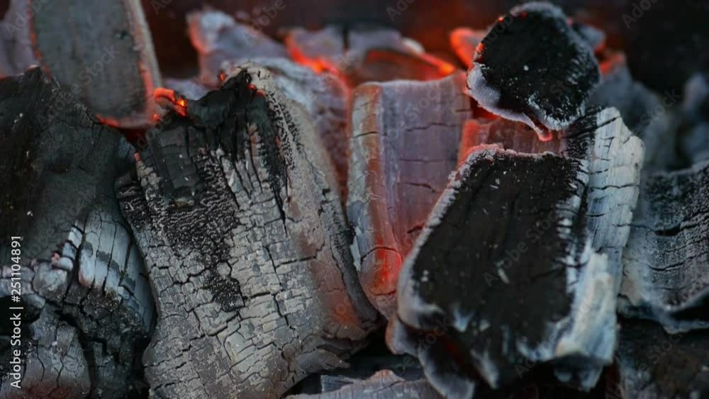 Closeup view of coals glowing in fireplace Closeup view of coals glowing in fireplace