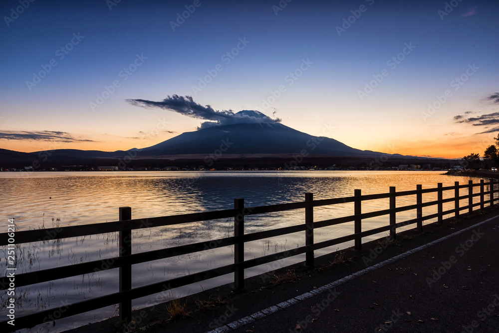 Fuji mountain at Lake Yamanaka at beautiful sunset, Yamanashi, Japan, Mount Fuji or Fujisan located on Honshu Island, is the highest mountain in Japan. Fuji mountain at Lake Yamanaka at beautiful sunset, Yamanashi, Japan, Mount Fuji or Fujisan located on Honshu Island, is the highest mountain in Japan.