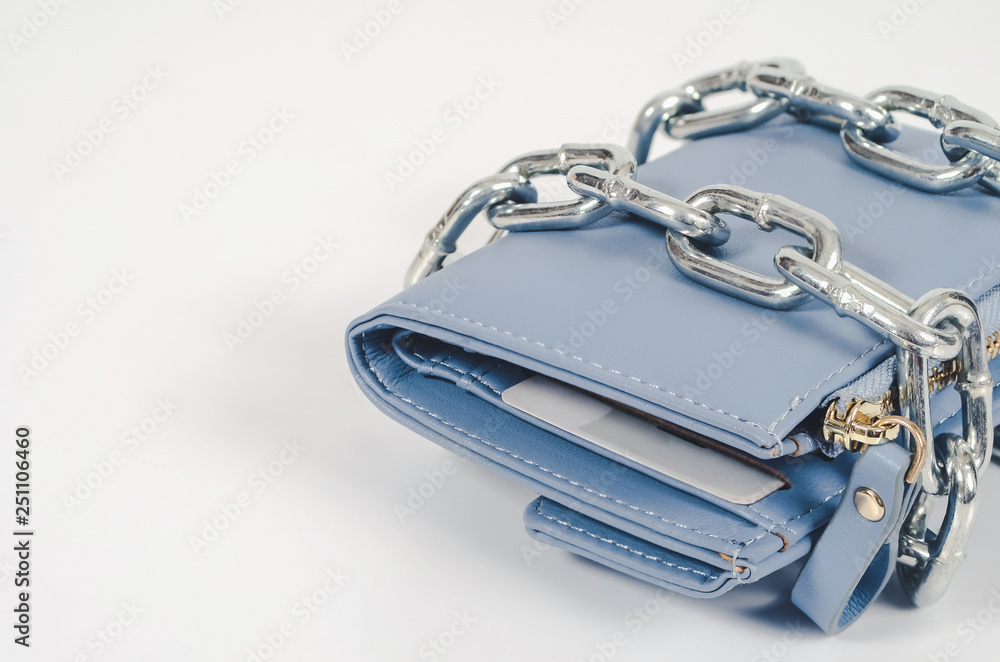 Wallet wrapped around with chain security money concept. Wallet wrapped around with chain security money concept.