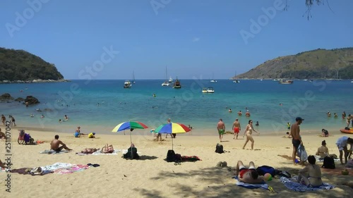 Time lapse of beautiful white sand beach in Phuket , Thailand photo