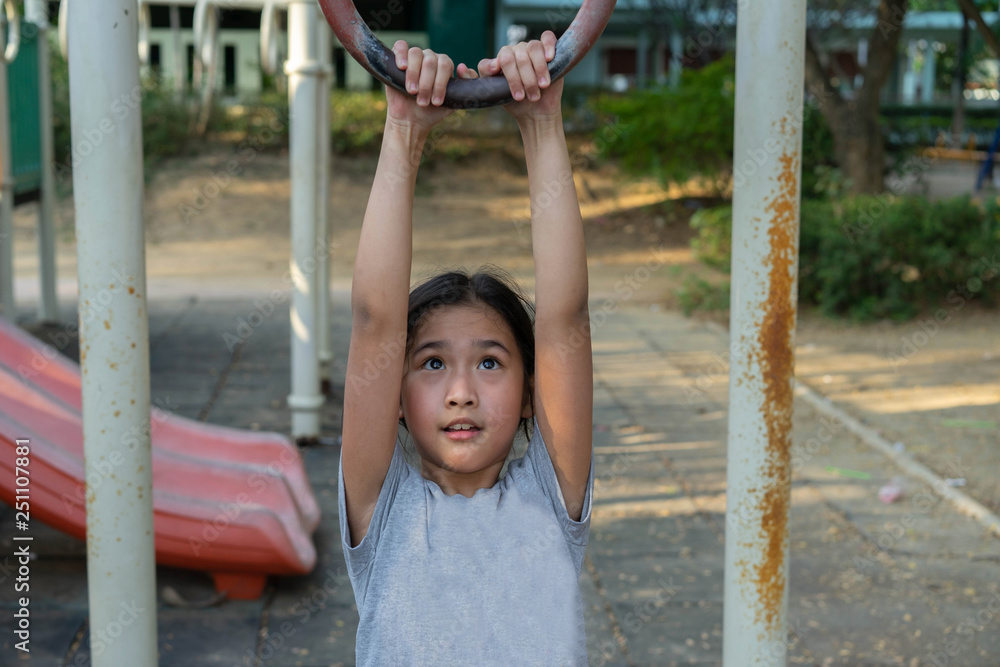 Fototapeta premium Portrait Asian little girl Playing the playground