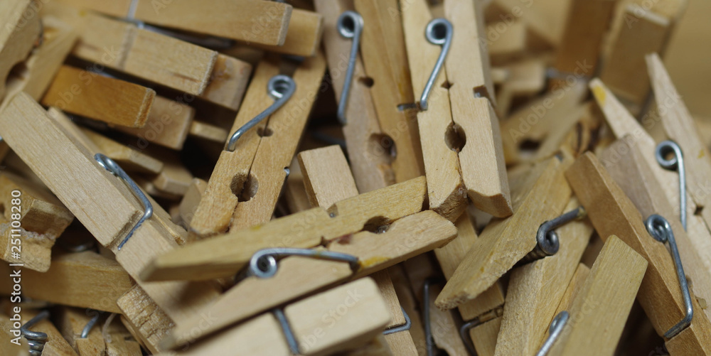 Small wooden clothes pins - these were used as small, inexpensive clamps for gluing up crafts projects.