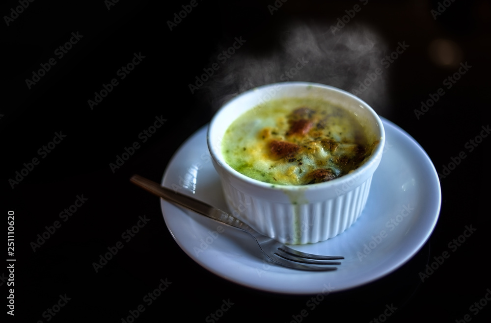 Baked spinach with cheese.Close up Baked spinach with cheese.Close up