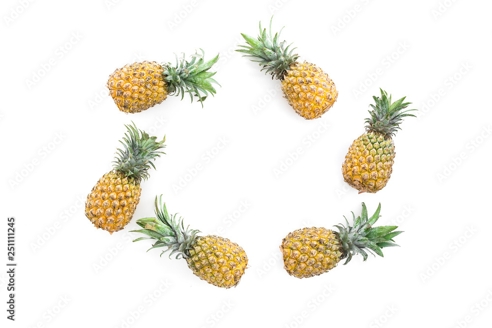 Food frame of pineapple fruits on white background. Flat lay, top view. Food concept Food frame of pineapple fruits on white background. Flat lay, top view. Food concept