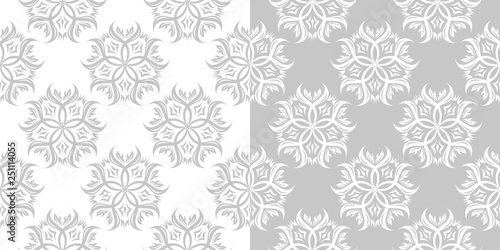 Floral seamless set of patterns. Gray and white backgrounds