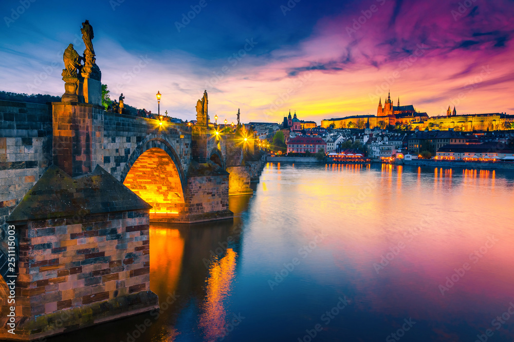 Fototapeta Majestic medieval stone Charles bridge at sunset, Prague, Czech Republic