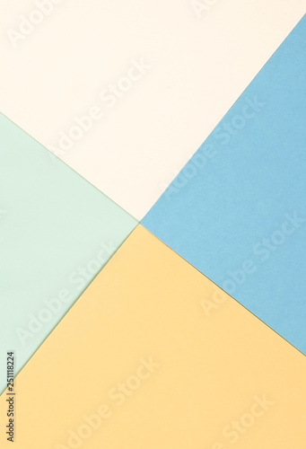 Abstract geometric paper background. Pale blue, yellow trend colors.Background fashion pastel colors. Minimal concept. Flat lay, Top view. Copy space