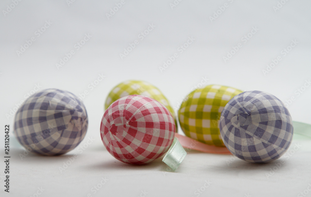 Colourful textile eggs on white background Colourful textile eggs on white background