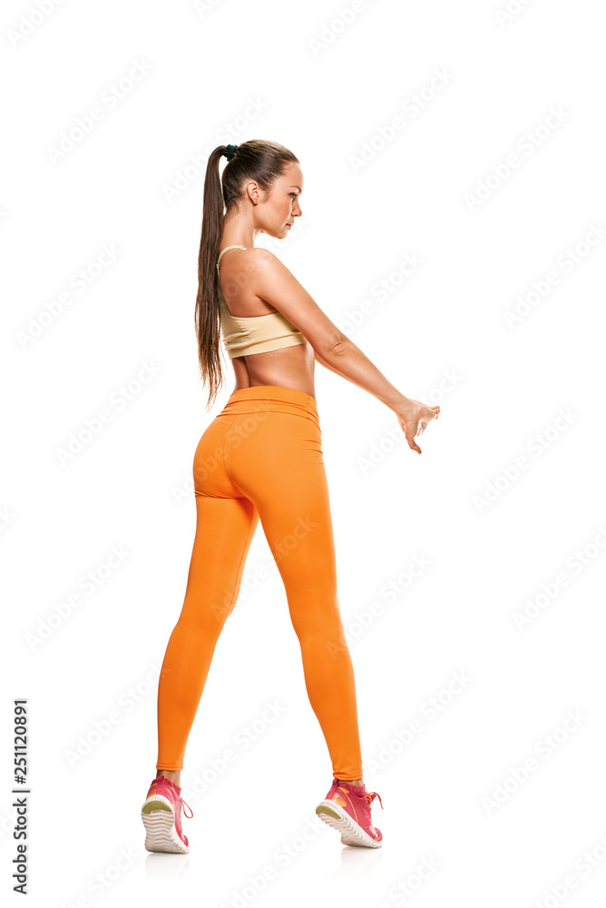 Full photo of fitness woman doing stretching workout