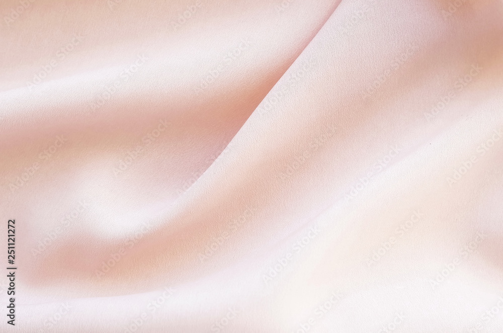 Fototapeta premium silk fabric background texture pastel pink color top view.