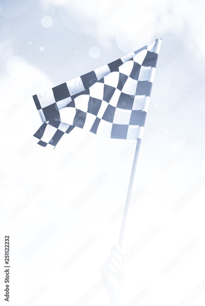 Checkered waving flag on city background. Concept