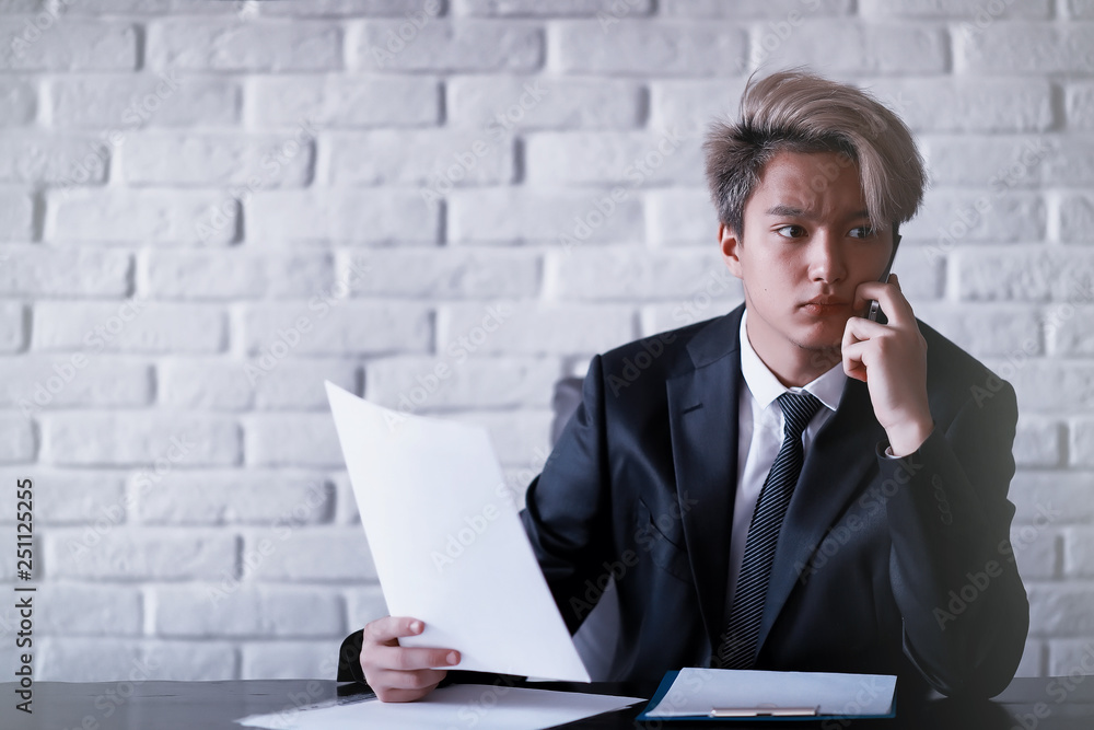 Young Asian businessman in white shirt and tie Young Asian businessman in white shirt and tie